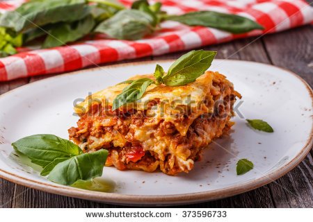 stock-photo-traditional-lasagna-made-with-minced-beef-bolognese-sauce-and-bechamel-sauce-topped-with-basil-373596733.jpg