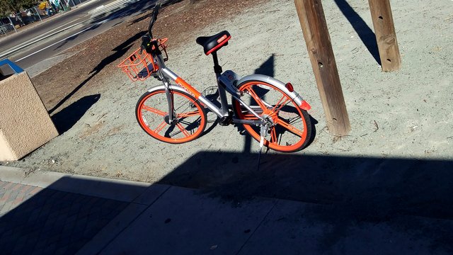 Orange Dockless bike left bxlphabet.jpg