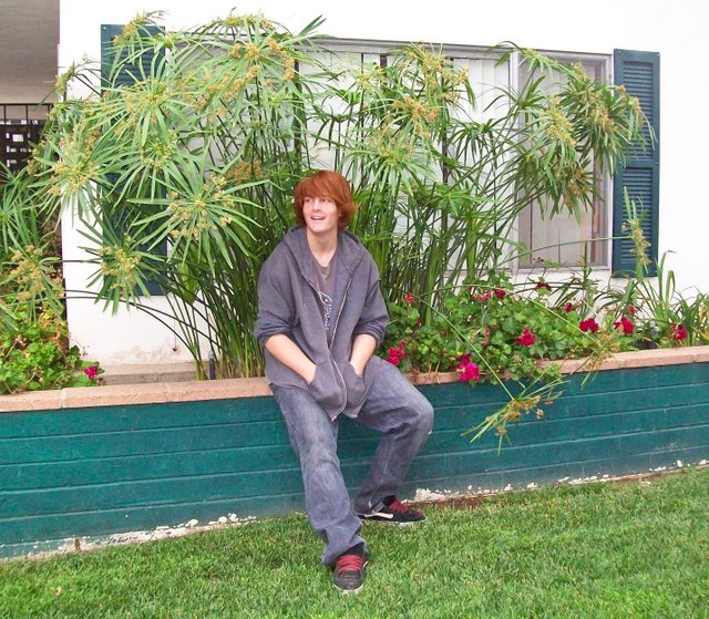 Caleb-on-the-planter-July-2010.jpg