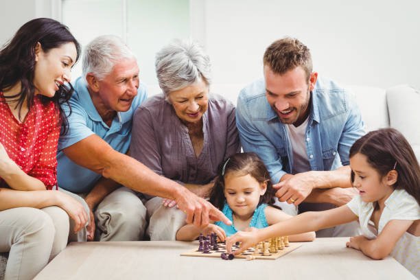 smiling-family-playing-chess.jpg