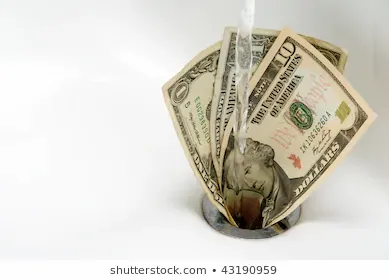 money-down-drain-260nw-43190959.webp