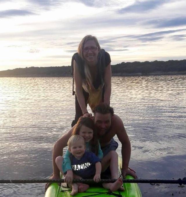 family on paddle board.jpg