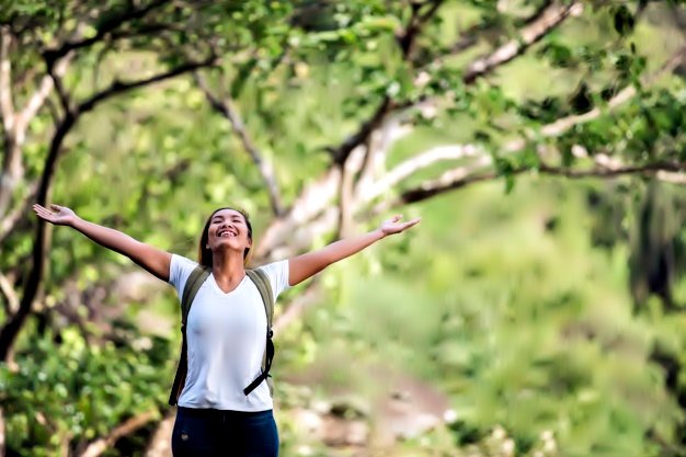 young-happy-woman-with-backpack-raising-hand-enjoy-with-nature_1150-4748.jpg