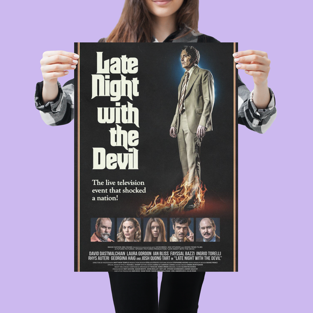 mockup-of-a-woman-holding-a-poster-against-a-solid-background-1321-el33-3.png