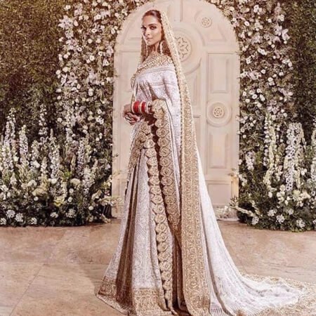 3. deepika-ivory-and-gold-chikankari-ensemble.jpg
