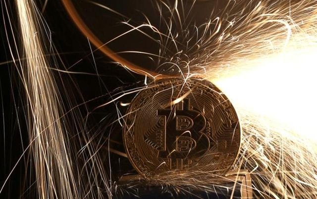 sparks-picture-illustration-broken-bitcoin-virtual-currency_099ffc1a-0b59-11e9-af2d-a06eafd7db38.jpg