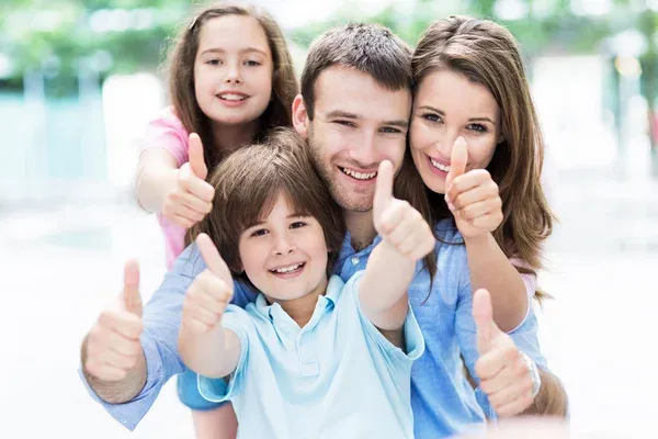 depositphotos_76181485-stock-photo-happy-young-family-thumbs-up.jpg