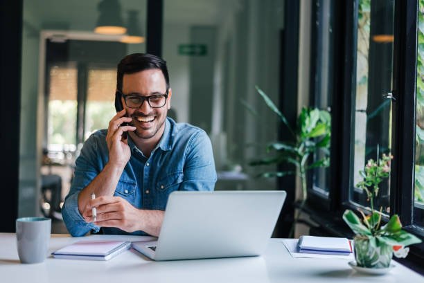 portrait-of-young-smiling-cheerful-entrepreneur-in-casual-office-picture-id1167803661.jpg