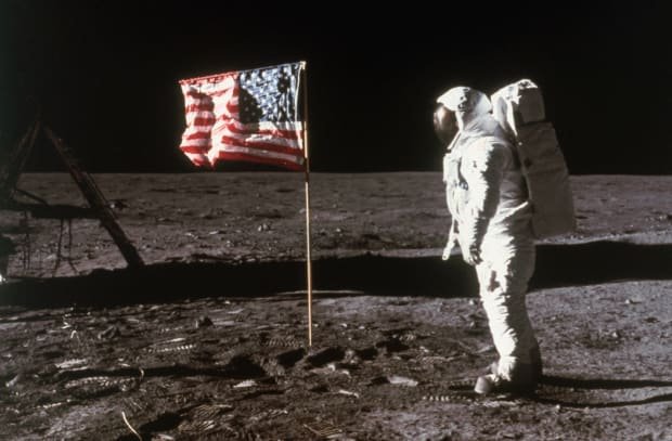 astronaut-aldrin-and-american-flag-on-the-moon-2.jpg