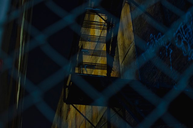 The metal staircase in the dark alley.JPG