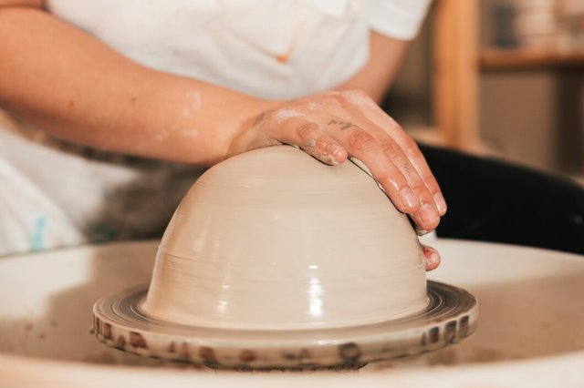 professional-potter-making-bowl-pottery-workshop_23-2148154764.jpg