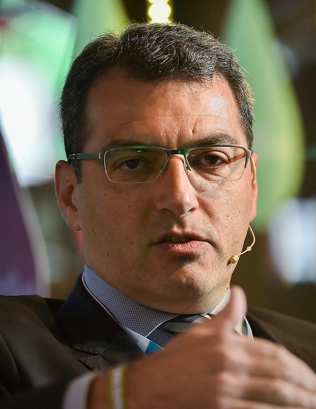 1024px-Damien_Comolli_Web_Summit_(cropped).jpg