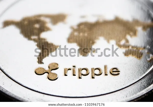 macro-coin-cryptocurrency-ripple-word-600w-1103967176.jpeg
