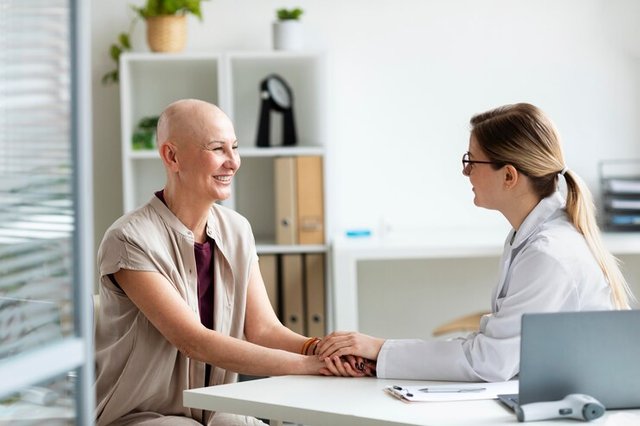 woman-with-skin-cancer-talking-with-doctor_23-2148988507.jpg