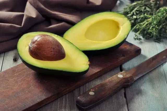 fresh-avocado-cutting-board-over-wooden-background.jpg