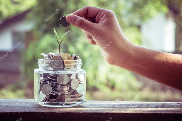 depositphotos_73281703-stock-photo-hand-putting-money-coins-with.jpg