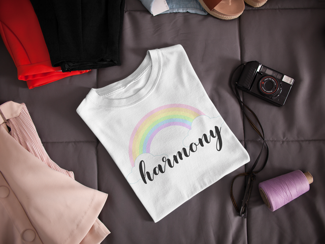 folded-t-shirt-mockup-lying-next-to-a-camera-and-clothes-on-a-bed-a16941 (3).png