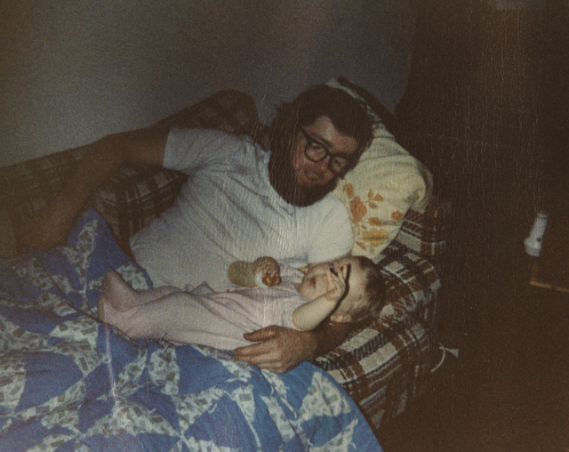 1980 apx Dad Holding Katie Couch.png