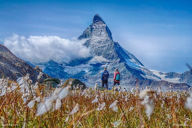 Hiking-in-the-Switzerland-alps-with-Matterhorn-peak-in-the-background.jpg