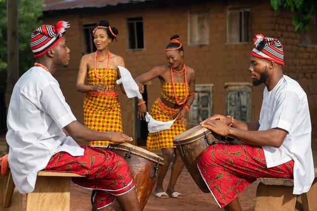 local-culture-with-nigerian-dancers-medium-shot_23-2149029487.jpg