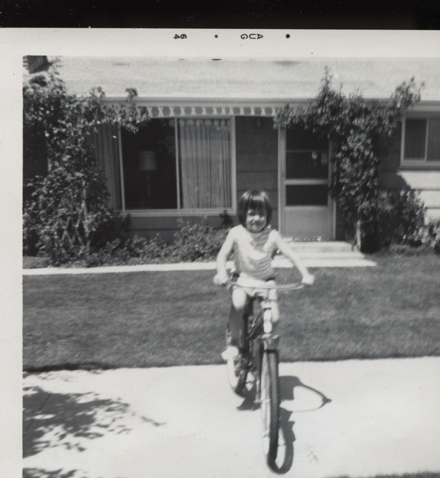 1964-08 Girl Bike.png
