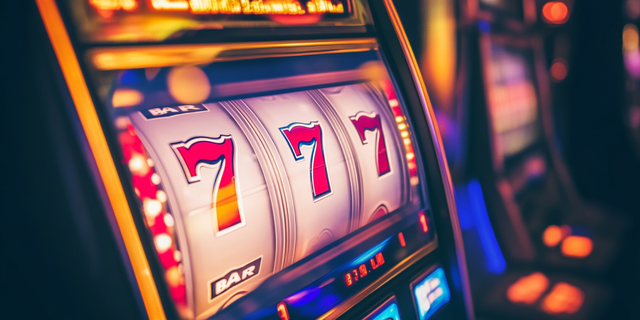 res.homd_A_vibrant_classic_slot_machine_with_bright_neon_ligh_bb3dc861-c715-4d10-bb4d-9029701339b2_2.png