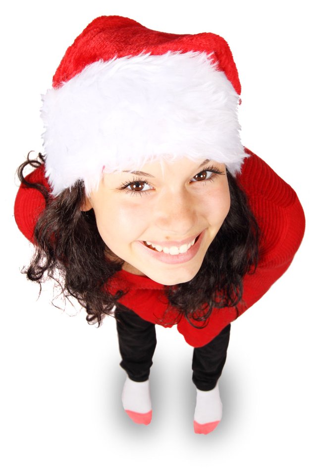 9110-a-beautiful-young-woman-with-a-christmas-hat-on-or.jpg