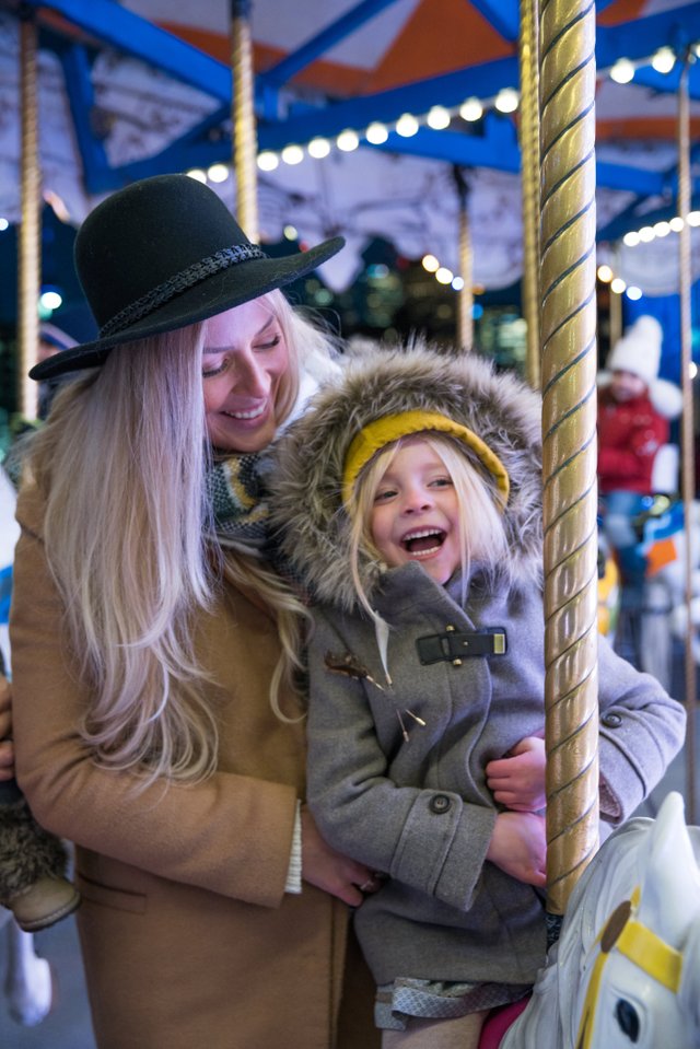 mother-and-daughter-on-carousel_4460x4460.jpg