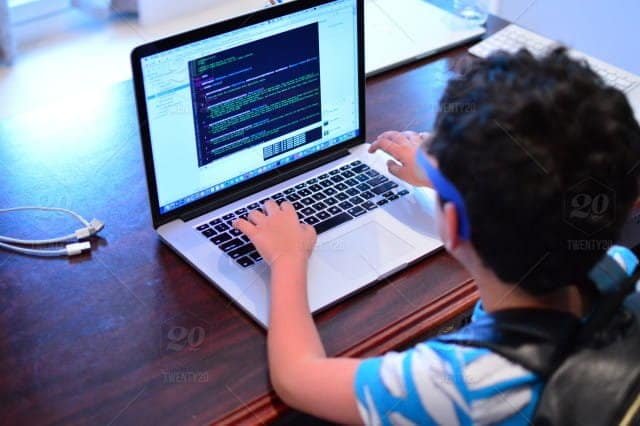 stock_photo_kid_creative_kids_typing_nerd_programming_pretending_working_on_computer_using_computer_a828b767_52a0_4aad_a4c8_c0e521b2c88f-YLF3GNfs-DzTechs.jpg