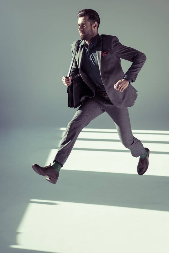 stock-photo-handsome-businessman-with-briefcase.jpg