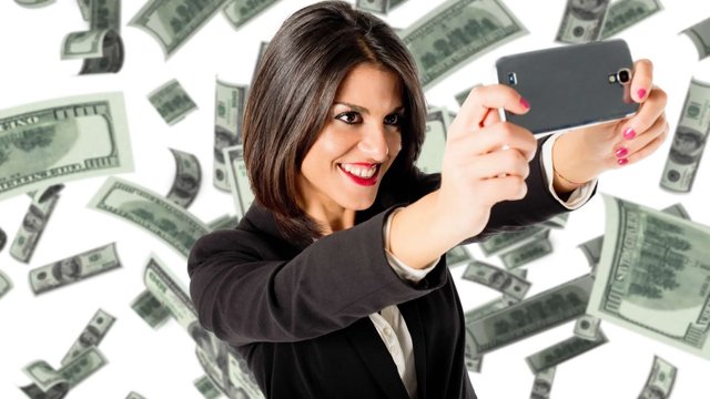 business-woman-selfie-with-money-in-background-dreamstime_m_46139046-2.jpg