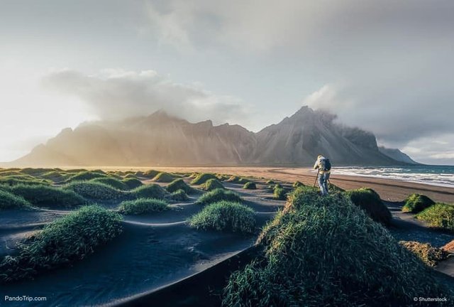 Photographer-taking-photo-of-famous-Vestrahorn-Mountain.jpg