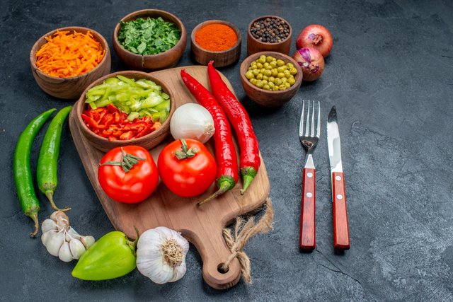 front-view-fresh-vegetables-with-greens-dark-table-salad-vegetable-ripe-color.jpg