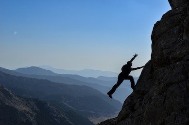 rock-climbing-bare-hands-260nw-487736113~2.jpg