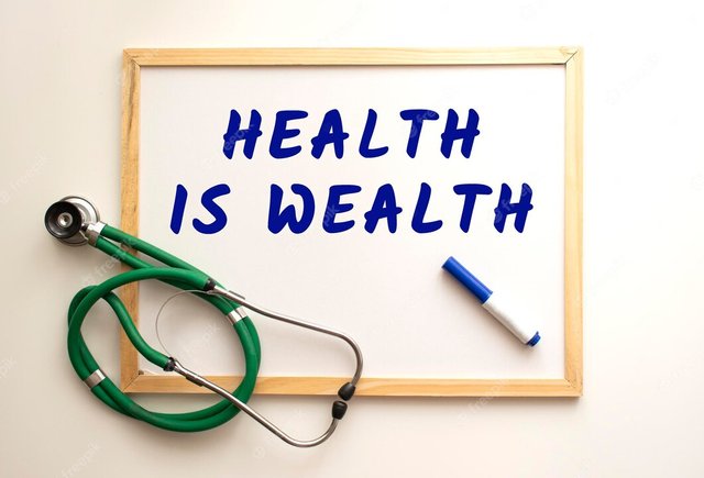 text-health-is-wealth-is-written-white-office-board-nearby-is-stethoscope_284815-5601.jpg