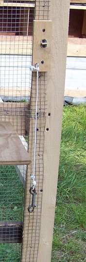 New pasture coop - water bucket shelf door latch crop June 2015.jpg