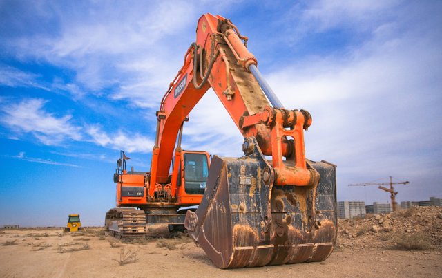 bucket-bulldozer-clouds-1078884.jpg