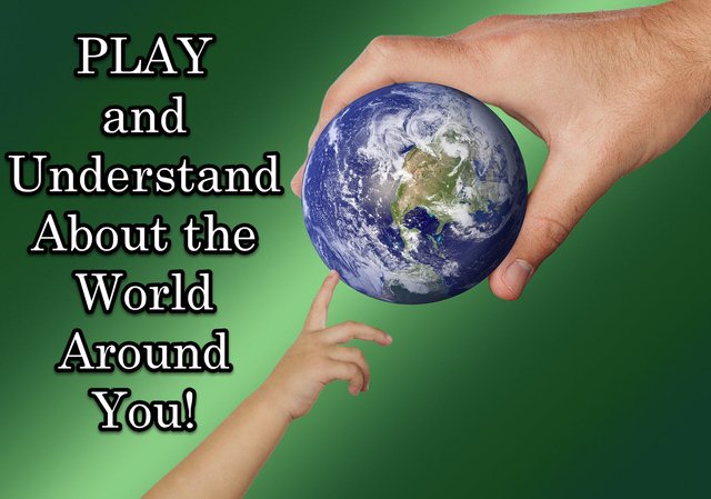 childs hand pointing at globe held in adults hand Play understand the world.jpg