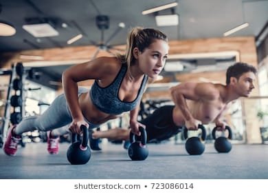 young-couple-working-out-gym-260nw-723086014.jpg