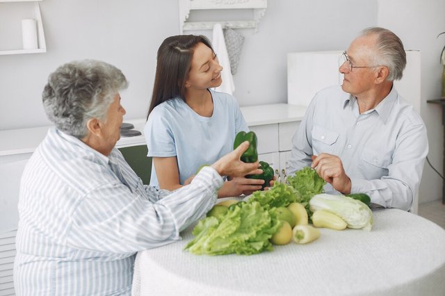 old-couple-kitchen-with-young-granddaughter_1157-28252.jpg