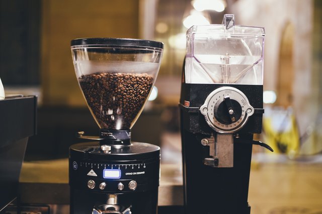 Coffee_machine_grinding_beans_(Unsplash).jpg