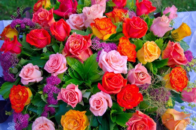 14944891-a-bouquet-of-multi-coloured-roses.jpg