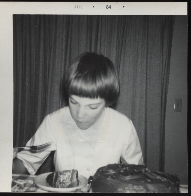 1965-07-03 Marilyn Morehead Eating 14th Birthday Cake.png