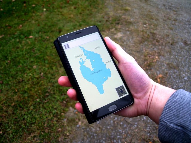 Smartphone_with_navigation_map_app.jpg