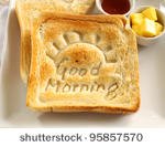 stock-photo-slice-of-toast-with-good-morning-carved-into-it-with-butter-and-honey-95857570.jpg