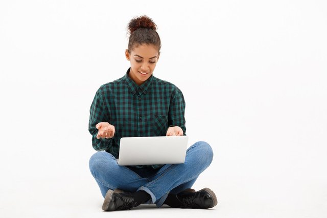 portrait-young-african-woman-with-laptop-white_176420-4657.jpg