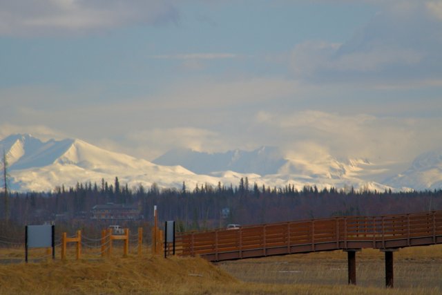 4-12 view of the mountains and the walkway to the wildlife view platform.jpg