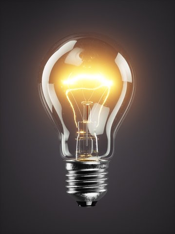 low-glowing-electric-bulb-lamp-on-dark-background.jpg