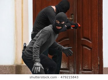 armed-thieves-breaking-door-260nw-479215843.jpg