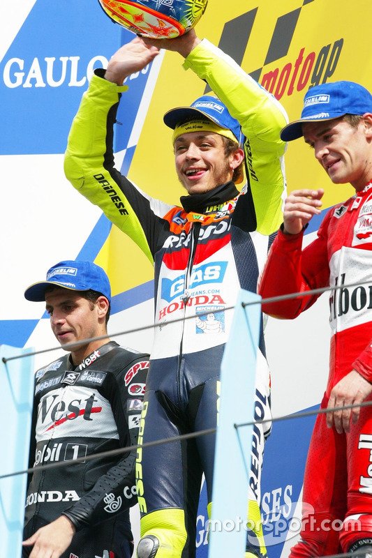 motogp-tt-assen-2002-podium-winner-valentino-rossi-honda-team-second-place-alex-barros-hon.jpg